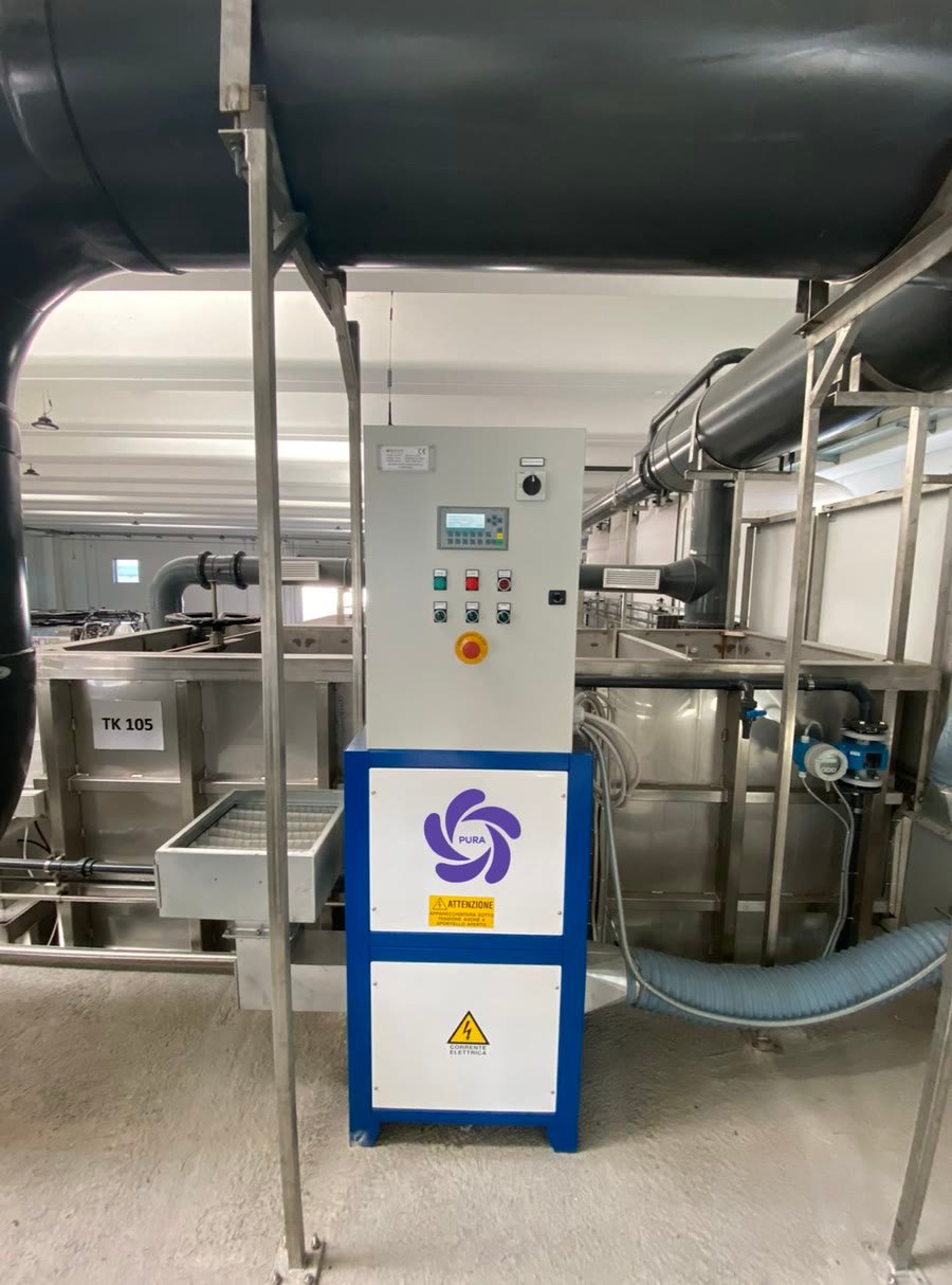 A PURA unit beside stainless process tanks