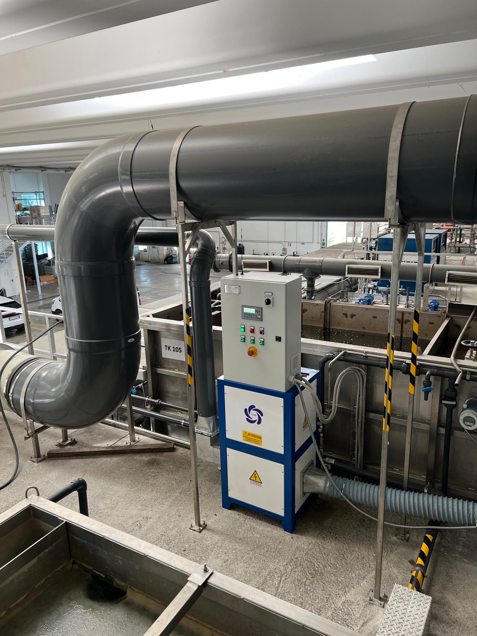 A PURA unit and large process ducting inside an industrial hall